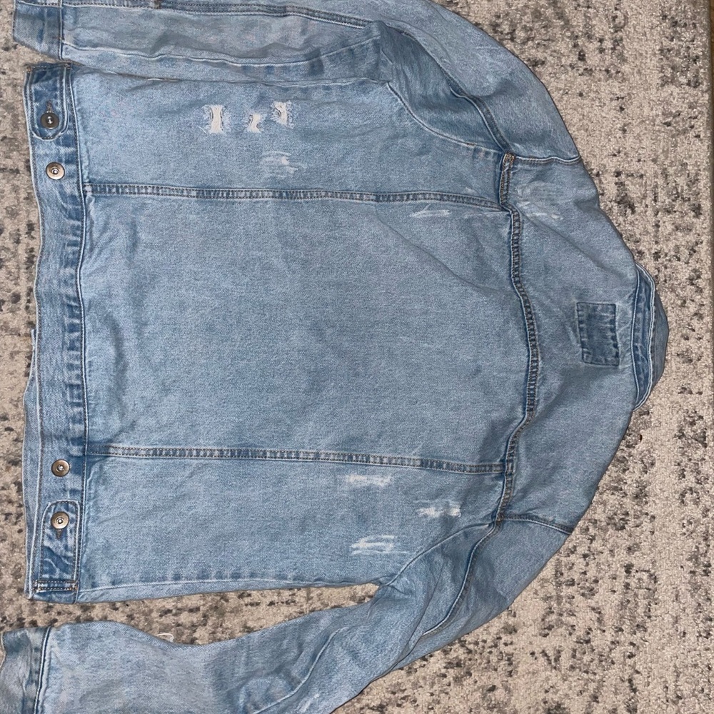 Distressed jean jacket
